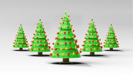 Animation-of-christmas-trees-spinning-on-grey-background
