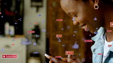Animation-of-network-of-connections-with-icons-over-african-american-woman-using-smartphone