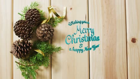 Animation-of-merry-christmas-text-over-pine-cones