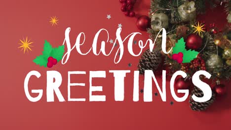 Animation-of-season-greetings-text-over-christmas-decorations