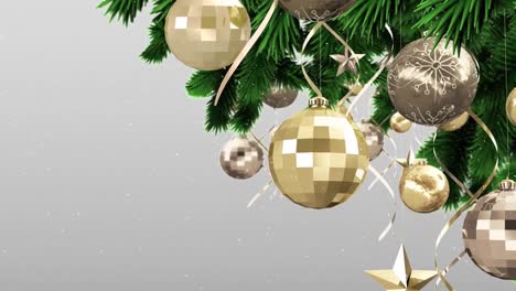 Animation-of-snow-falling-over-fir-tree-with-christmas-baubles-on-grey-background