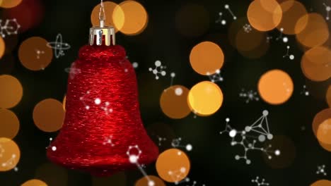 Animation-Von-Molekülen-über-Weihnachtsdekorationen-Und-Lichtflecken-Auf-Schwarzem-Hintergrund