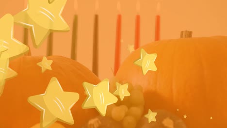 Animation-Von-Goldenen-Sternen-über-Kwanzaa-Kerzen-Und-Kürbissen