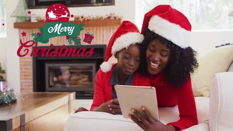 Animation-of-merry-christmas-text-over-african-american-mother-and-son-smiling