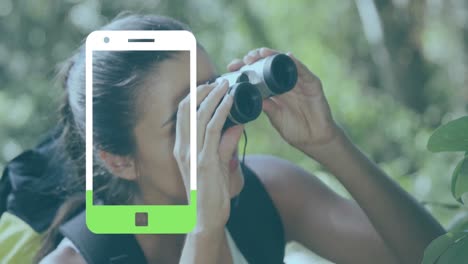 Animation-of-smartphone-icon-over-caucasian-woman-using-binoculars