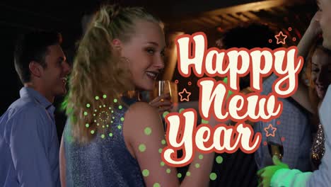 Animation-of-happy-new-year-text-and-green-fireworks-over-happy-caucasian-woman-dancing-at-party