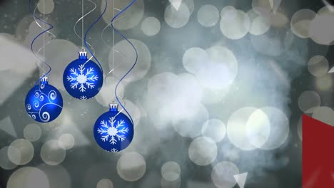 Animation-of-falling-triangles-and-bokeh-effect-over-multiple-design-in-blue-colored-baubles