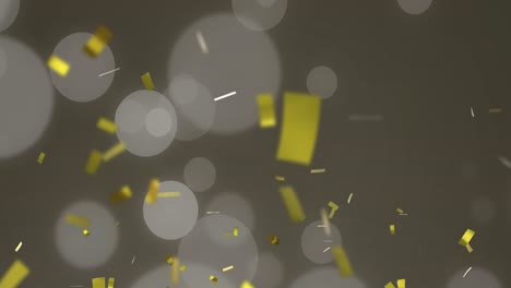 Animation-of-gold-christmas-confetti-falling-with-spots-of-light-on-grey-background