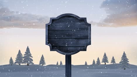 Animation-of-christmas-snow-falling-over-blank-wooden-sign-in-winter-landscape