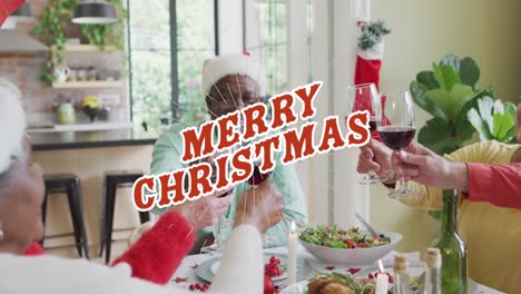 Animation-of-merry-christmas-text-over-diverse-senior-friends-making-a-toast-at-christmas-dinner