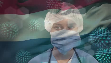 Animation-of-flag-of-netherlands-and-virus-cells-over-caucasian-doctor-with-face-mask