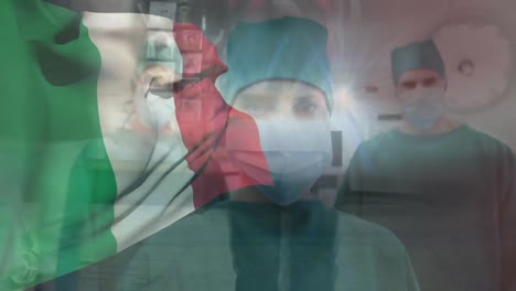 Animation-of-flag-of-italy-over-caucasian-doctors-with-face-masks