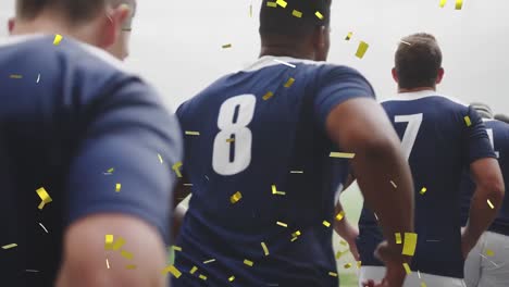 Animation-of-confetti-falling-over-diverse-male-rugby-players-at-stadium