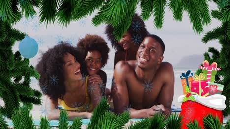 Animation-of-fir-tree-frame-and-snowflakes-over-happy-african-americna-family-on-beach