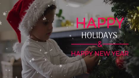 Animation-of-happy-holidays-over-caucasian-boy-in-santa-hat-decorating-tree