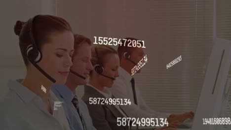 Animation-of-numbers-processing-over-diverse-business-people-using-phone-headsets-in-office