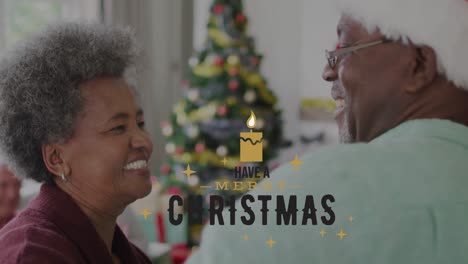 Animation-of-christmas-greetings-text-over-smiling-senior-african-american-couple-at-christmas