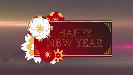 Animation-of-happy-new-year-text-on-envelope-with-flowers-against-lens-flares-in-background