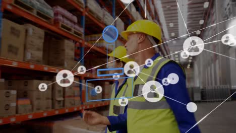 Animation-of-network-of-connections-over-two-caucasian-warehouse-worker
