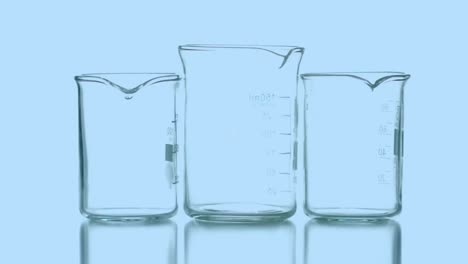 Animation-of-data-processing-over-beakers-with-liquid-on-blue-background