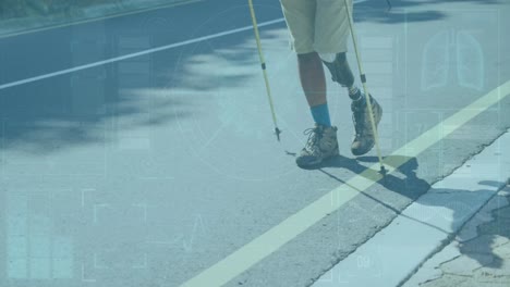 Animation-Eines-Digitalen-Bildschirms-über-Einem-Afroamerikanischen-Mann-Mit-Beinprothesen,-Der-Nordic-Walking-Trainiert