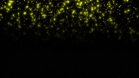 Animation-of-glowing-yellow-spots-falling-on-black-background