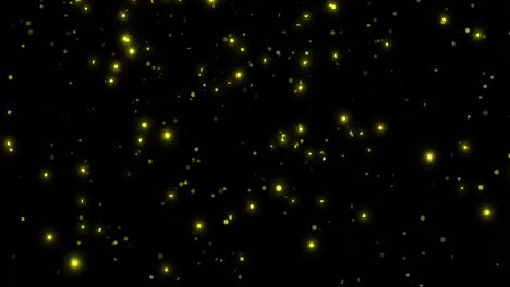 Animation-of-glowing-yellow-spots-falling-on-black-background