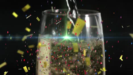 Animation-Von-Konfetti-über-Einem-Glas-Champagner