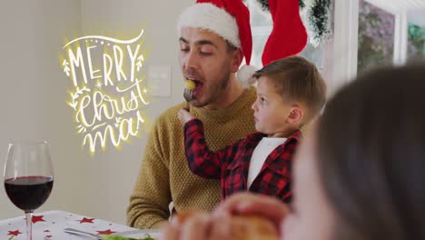 Animation-Des-Textes-„Frohe-Weihnachten-Und-Ein-Glückliches-Neues-Jahr“-über-Einer-Kaukasischen-Familie-Mit-Weihnachtsmützen