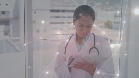 Animation-of-network-of-connections-over-biracial-female-doctor