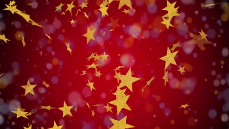 Animation-Von-Weihnachtlichen-Goldenen-Sternen-Und-Schnee,-Der-Auf-Roten-Hintergrund-Fällt