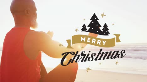 Animation-of-merry-christmas-text-over-senior-african-american-man-at-beach
