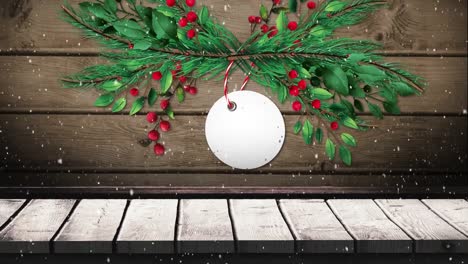 Animation-of-christmas-sign-with-copy-space,-decorations-and-snow-falling-on-wooden-background