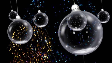 Animation-of-christmas-baubles-dangling-over-fireworks-exploding-on-black-background