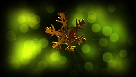 Animation-of-christmas-gold-snowflake-over-green-spots-of-light-in-background