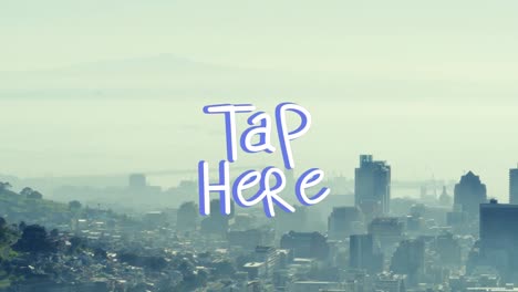 Animation-of-tap-here-text-banner-against-aerial-view-of-cityscape