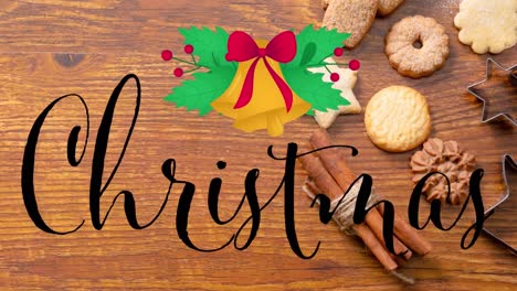 Animation-of-christmas-text-over-christmas-cookies-and-decorations-on-wooden-background