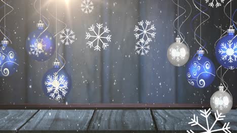 Animation-Von-Schnee,-Der-über-Weihnachtskugeln-Fällt