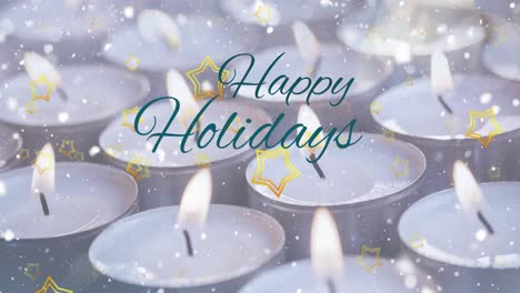 Animation-of-snow-and-golden-stars-falling-over-happy-holidays-text-banner-and-burning-candles