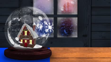 Animation-of-house-in-a-snow-globe-against-view-of-winter-landscape-from-window-frame