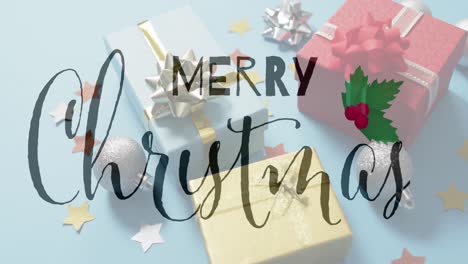 Animation-of-christmas-greetings-text-over-christmas-presents-and-decorations