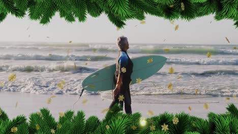 Animation-of-christmas-decoration-over-biracial-woman-with-surfboard-on-beach