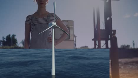 Animation-of-wind-turbine-over-woman-and-electricity-pylons