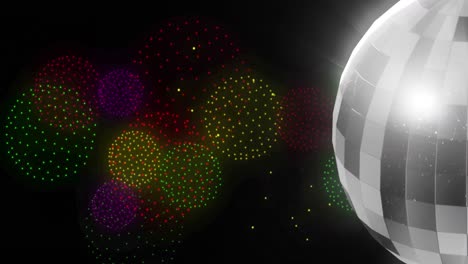 Animation-of-disco-ball-over-shapes-and-fireworks-on-black-backrgound