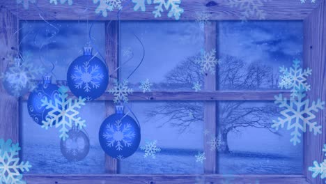 Animation-Von-Schnee,-Der-über-Weihnachtskugeln,-Dekoration-Und-Winterlandschaft-Fällt