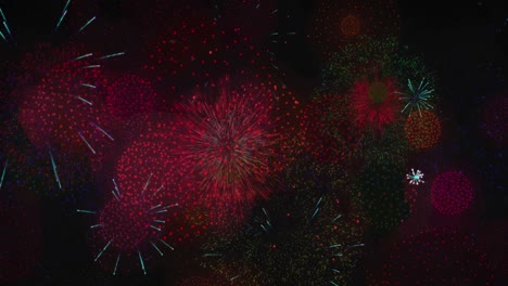Animation-of-happy-new-year-text-over-fireworks-on-black-backrgound