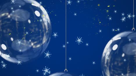 Animation-of-yellow-light-trails-and-stars-falling-over-christmas-baubles-on-blue-background