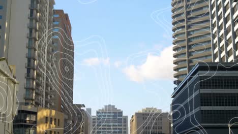 Animation-of-hello-text-in-white-and-black-over-contour-lines,-blue-sky-and-modern-city-buildings