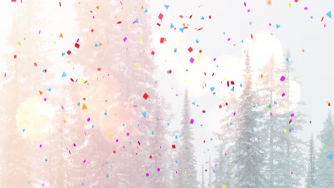 Animation-of-confetti-falling-over-christmas-trees-in-winter-scenery