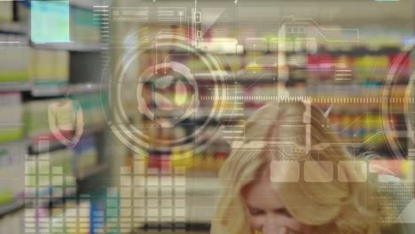Animation-of-data-processing-over-caucasian-woman-shopping